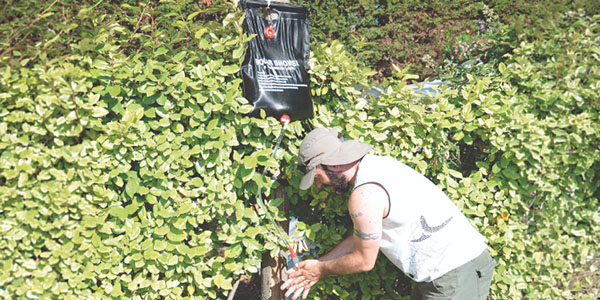 Douche solaire en sac suspendue pour le camping